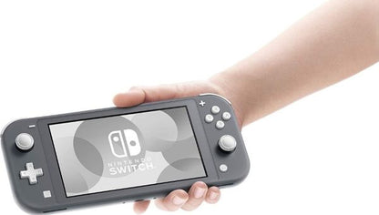 Hand holding a Nintendo Switch console with a clear screen showing the brand logo.